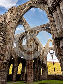 Ruins of an ancient 12th century monastery in the autumn Tintern Abbey, Wales