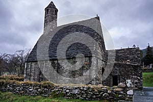 Ruins of ancient and abandoned St. Kevins Church, Glendalough, Ireland