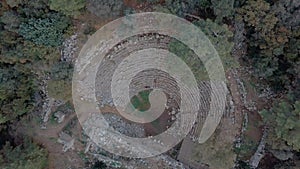 Ruins of an ancient amphitheater. Ancient ruins on the Lycian way. Aerial view.