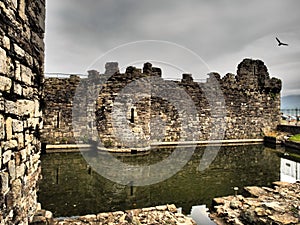 Ruins-Ancient Beaumaris Castle and the Island of Anglesey North Wales photo