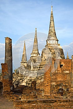 The ruins of the ancient Buddhist temple of Wat Phra Si Sanphet on a sunny morning. Ayutthaya, Thailand