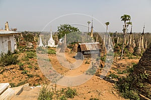 Ruins of ancient Burmese Buddhist pagodas Nyaung Ohak in the village of Indein on Inlay Lake in Shan State