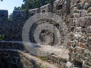 Ruins of an ancient castle. At the archaeological site. Ruined Palace Museum. Fortress Gonio. The architecture of antiquity.