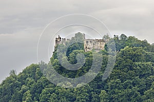 Ruins of an ancient castle on top of a mountain