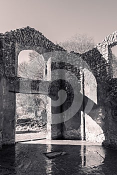 Ruins of ancient catholic church in Italy - black and white photo