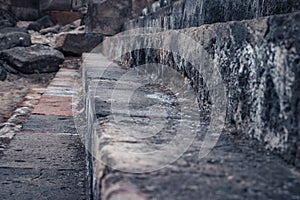 Ruins of an ancient Christian temple stairway close up photo.