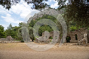 Ruins of the ancient city of Olympos in Cirali village in Antalya, Turkey. Local and foreign tourists come to visit the ancient ci