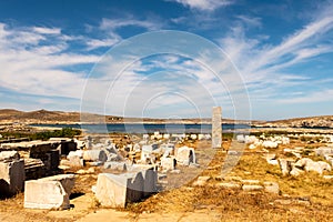 Ruins of an ancient city with stones, columns and temples on DELOS Island, Greece