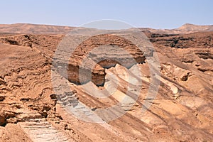 Ruins of ancient fortress of Massada on the mountain in deser Negev near Dead sea in southern Israel