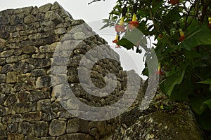 Ruins of the ancient Inca city machu picchu in fog, Peru