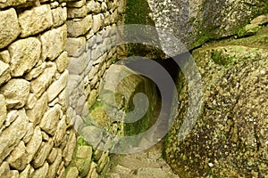 Ruins of the ancient Inca city machu picchu in fog, Peru