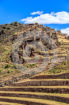 Ruins of ancient Incan citadel with terraces on the mountain, P