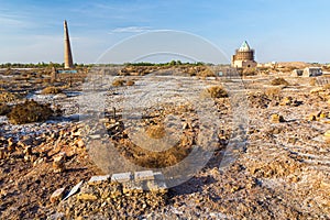 Ruins of ancient Konye-Urgench, Turkmenistan. Kutlug Timur Minaret and Sultan Tekesh Mausoleum visibl