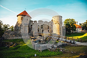 The ruins of ancient Livonian castle in the old town of Cesis in Latvia during a warm sunset