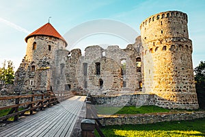 The ruins of ancient Livonian castle in the old town of Cesis in Latvia during a warm sunset