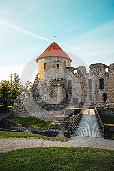 The ruins of ancient Livonian castle in the old town of Cesis in Latvia during a warm sunset