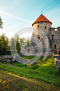 The ruins of ancient Livonian castle in the old town of Cesis in Latvia during a warm sunset
