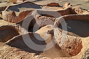 Ruins of the Ancient Mud Huts of Aldea de Tulor Village Complex, San Pedro de Atacama, Antofagasta region of Northern Chile photo
