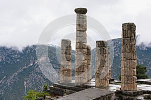 Ruins of an ancient temple, Temple Of Apollo At Delphi Oracle, Greece, majestic mountain ladscape photo
