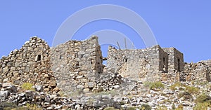 Ruins of ancient Venetian windmills built in 15th century, Lassithi Plateau, Crete, Greece