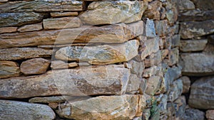 The Ruins of an Antique House Built of Rock and Stone