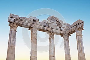 Ruins of Apollo temple at sunset sky background in Side, Antalya, Turkey