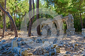 Ruins of aqueduct in ancient city of Phaselis near Camyuva, Turkey