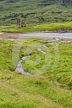 The ruins of Ardvreck Castle at Loch Assynt in Scotland