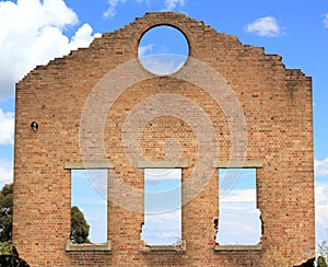 Ruins of blast furnace plant single wall photo