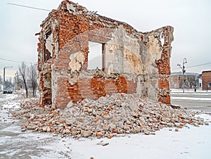 Partially Collapsed Brick Building in Winter