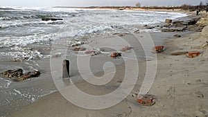 Ruins of the building on the stormy beach