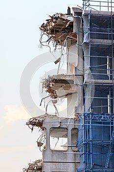 Ruins of building under destruction, urban scene.