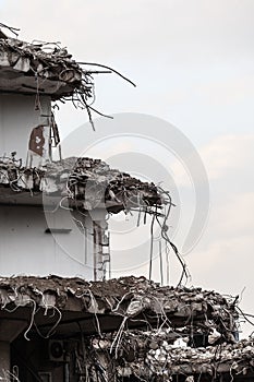 Ruins of building under destruction, urban scene.