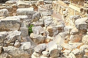 Ruins of buildings in Knossos archeological site on Crete