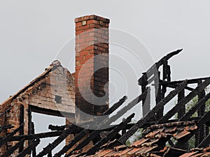 Ruins of a burned down residential building after a fire