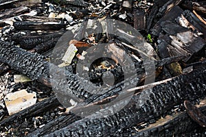 Ruins of a burned wooden house