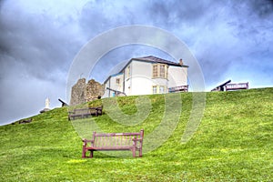 Ruins and cannon on Tenby hill Pembrokeshire Wales UK
