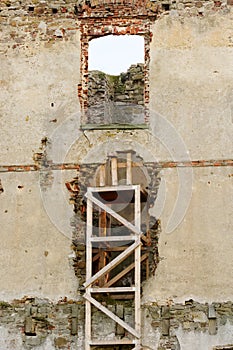 Ruins of the castle in Bodzentyn, Poland. Wooden frame securing the remains of the castle.