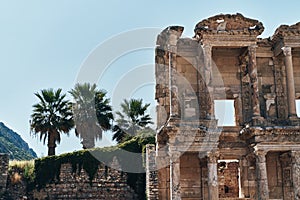 The ruins of Celsus Library in Ephesus at sunny evening sun. Beautiful light of the old ancient rocks and stones, turkey