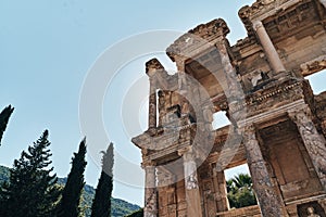 The ruins of Celsus Library in Ephesus at sunny evening sun. Beautiful light of the old ancient rocks and stones, turkey