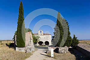 Ruins and chapel of Clunia photo