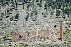 Ruins and chimneys of the foundry factory of the old Santa Constanza copper mine, photo