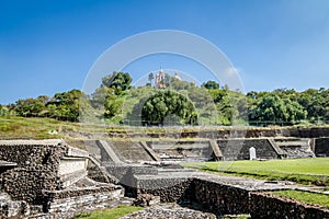 Ruins of Cholula pyramid with Church of Our Lady of Remedies at