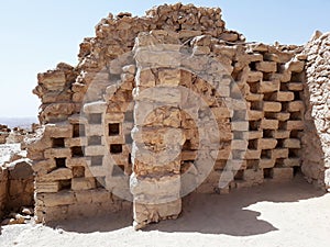 Ruins of a columbarium tower at the ancient Masada, Southern district, Israel.