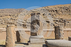 Ruins of columns in the Persepolis in Shiraz, Iran. The ceremonial capital of the Achaemenid Empire. UNESCO World Heritage