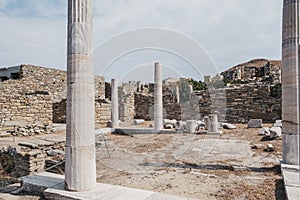 Ruins and columns in the Theatre Quarter on the island of Delos, Greece