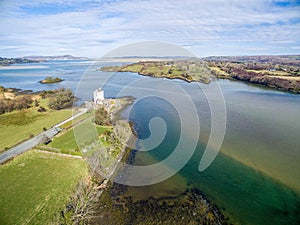 Ruins of Doe Castle in the sun, aerial