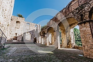 Ruins of the Doria Castle in Dolceacqua, arches and walls, daytime, Italy