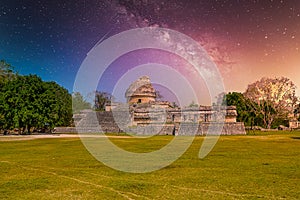 Ruins of El Caracol observatory temple, Chichen Itza, Yucatan, Mexico, Maya civilization with Milky Way Galaxy stars night sky