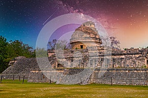 Ruins of El Caracol observatory temple, Chichen Itza, Yucatan, Mexico, Maya civilization with Milky Way Galaxy stars night sky